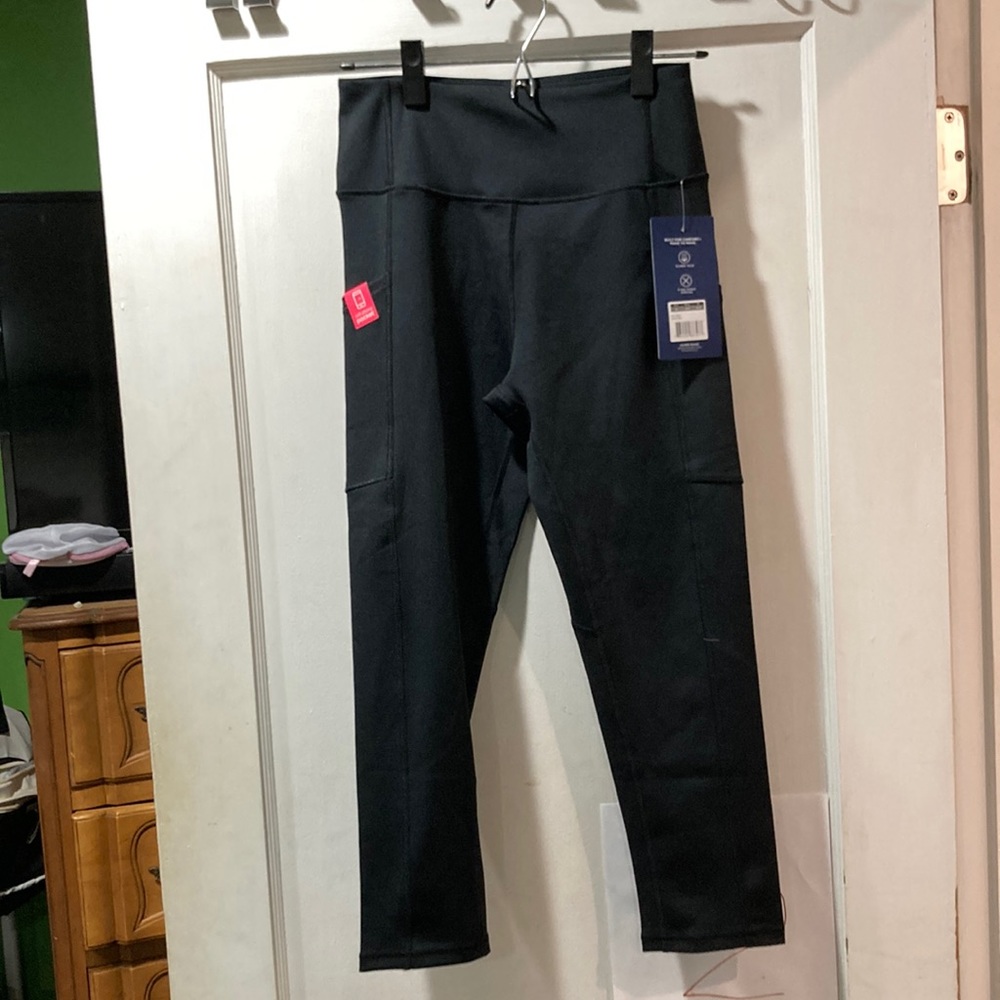 Marika black capri leggings with pockets. New with tags.